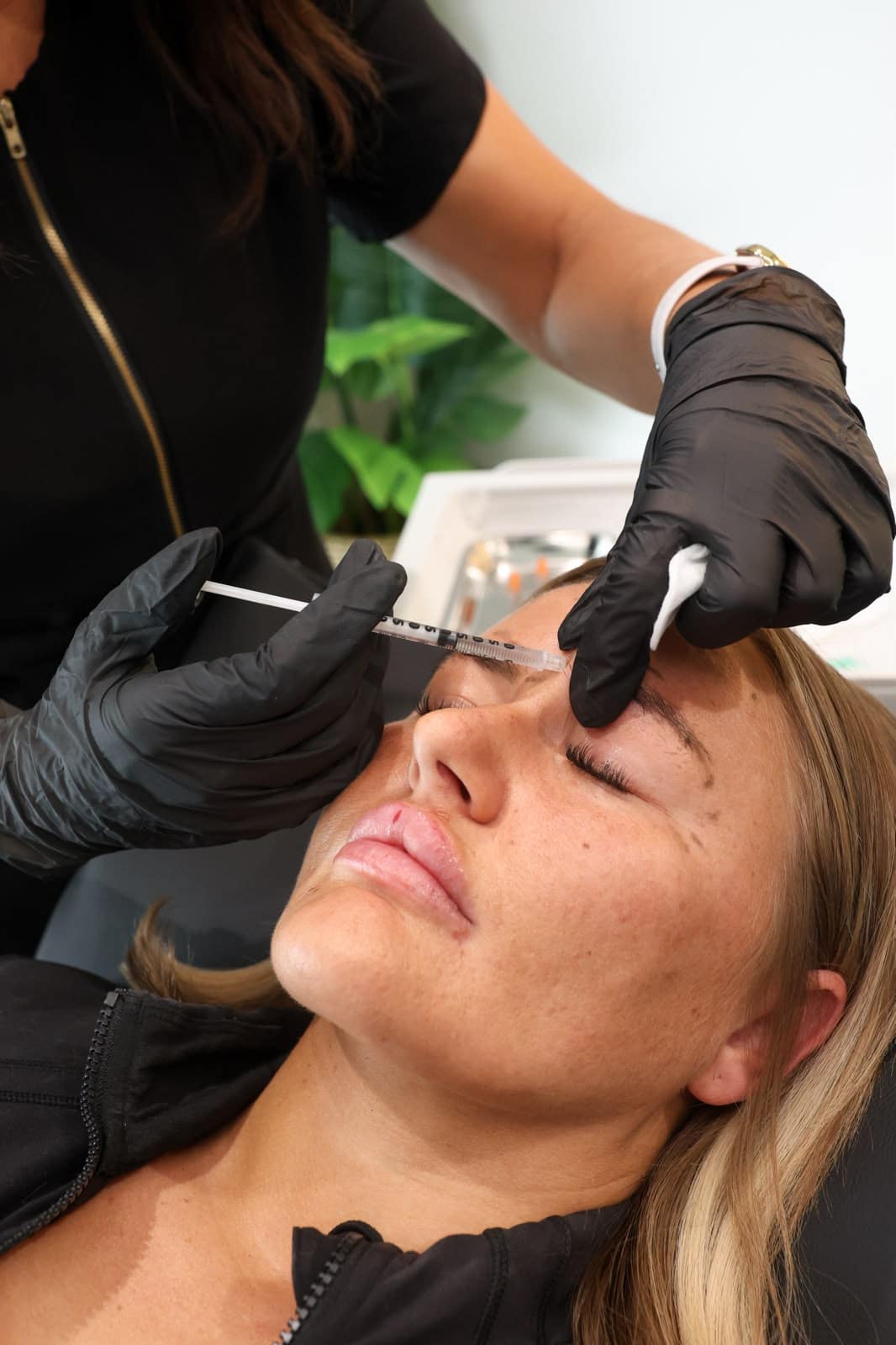Safina Young administering anti-wrinkle injections at her Bracknell clinic