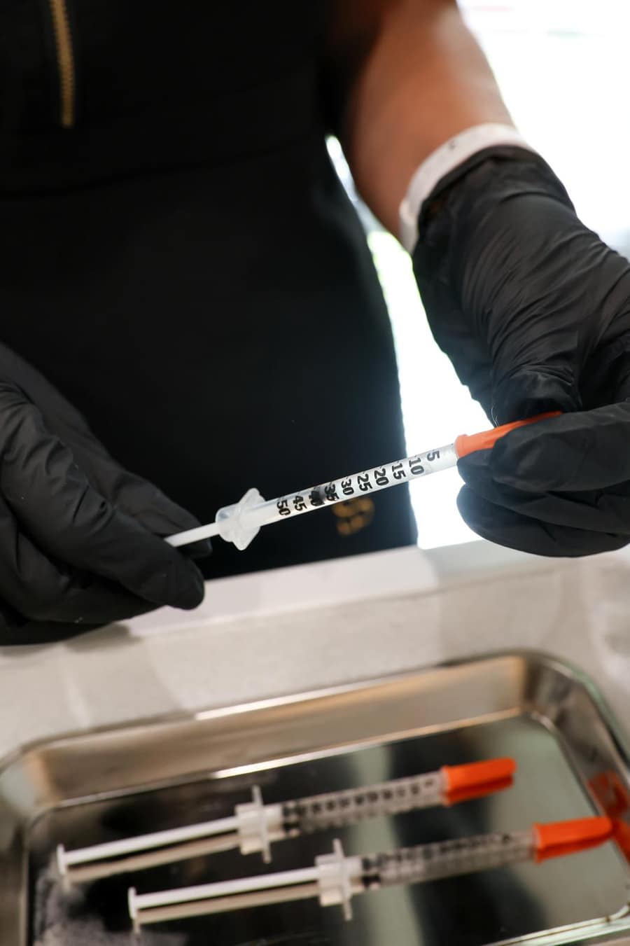 Prepared dermal filler syringes on a sterile tray at Lady Young's Bracknell clinic
